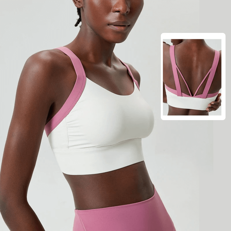 Women's athletic sports two-color bra top SF2091, featuring stylish white and pink design, perfect for yoga and fitness activities.